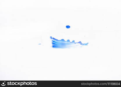 Blue water splashes On a white background, Photography. Blue water splashes.