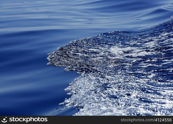 Blue water textures, waves foam, action, mediterranean sea