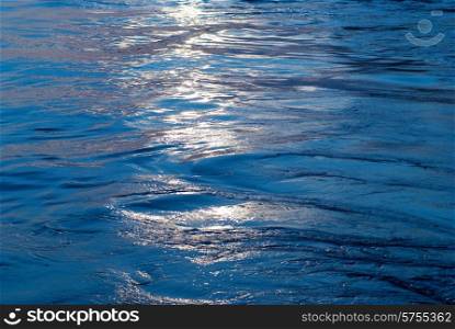 Blue water with sun line can be used for background