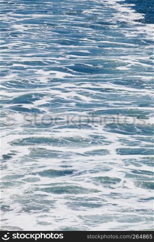 Blue white ocean water wave foam abstract background. Ocean water abstract background