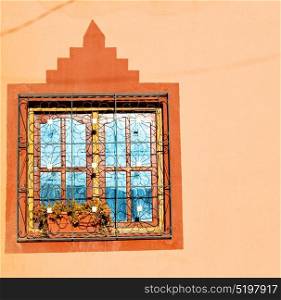 blue window in morocco africa old construction and brown wall construction