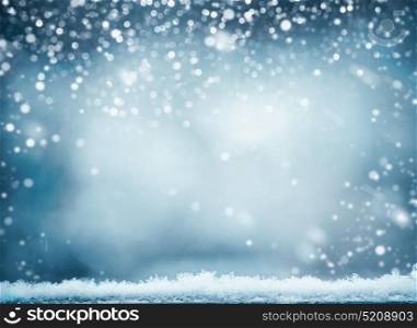 Blue winter background with snow. Winter holidays and Christmas concept