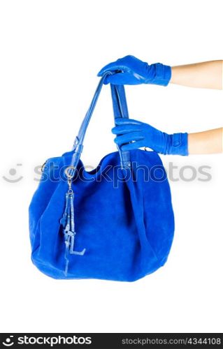 blue women bag at hand isolated on white background