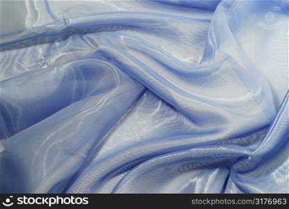 Blue wrinkled fabric background