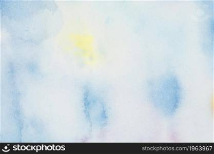 blue yellow spots paints white paper. High resolution photo. blue yellow spots paints white paper. High quality photo