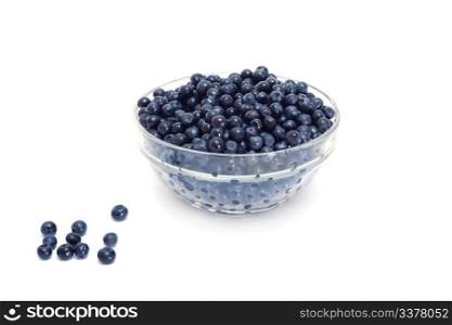 blueberries in a glass bowl isolated on white