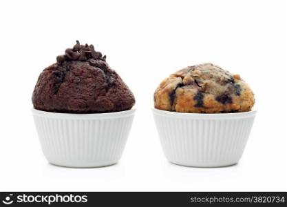 Blueberry and chocolate muffins isolated on white background