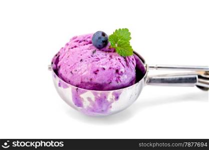 Blueberry ice cream with mint in a special metal spoon isolated on white background
