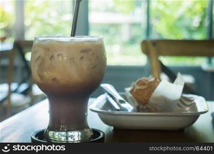 Blueberry muffin and iced coffee mocha, stock photo