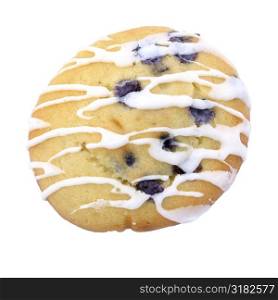 Blueberry Muffin Cookie Over White With Icing.