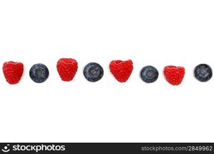 Blueberry on a background of raspberries