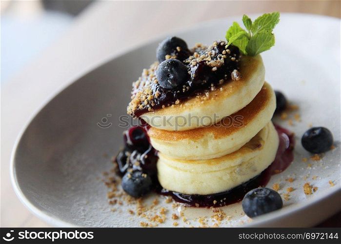 Blueberry pancake , Pancake topping with blueberries and icing dessert