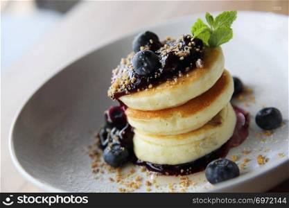 Blueberry pancake , Pancake topping with blueberries and icing dessert