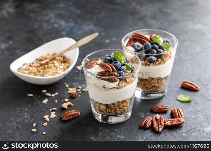 Blueberry parfait with ricotta cheese, granola and pecan nuts