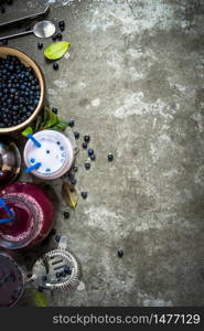 Blueberry with blueberry smoothies and juice. On the stone table.. blueberry smoothies and juice