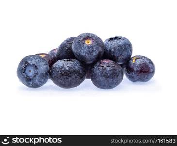 blueberry with water drops isolated on white background.
