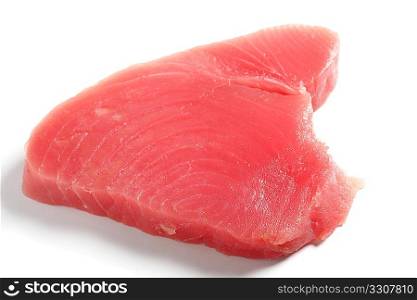 Bluefin tuna (blue ahi tuna) steak, over white. This is regarded as the finest tuna and is the kind used in sushi.