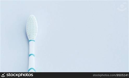 Blueish white toothbrush isolated on white.