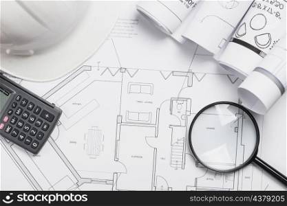 blueprint with magnifying glass