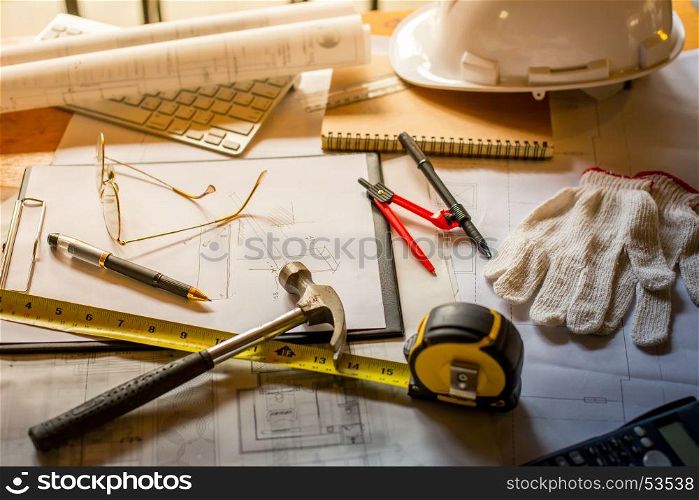 Blueprints, Hardhat, Glasses, Stickers, Construction level, Pen in architecture office retro style.