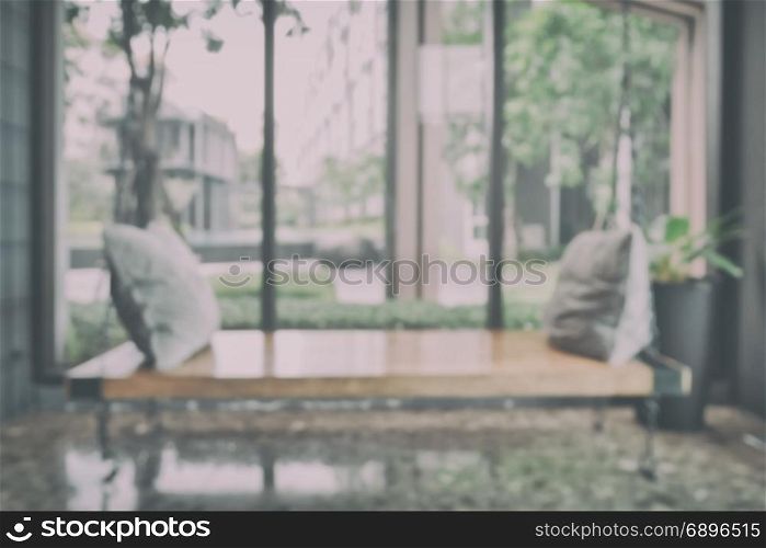 Blur background cozy bench at resort lobby