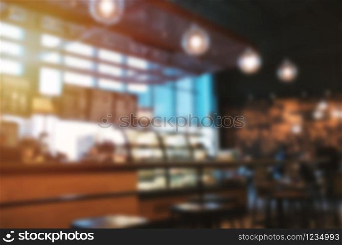 Blur background hipster cafe or restaurant interior with vintage style tone