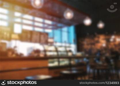 Blur background hipster cafe or restaurant interior with vintage style tone