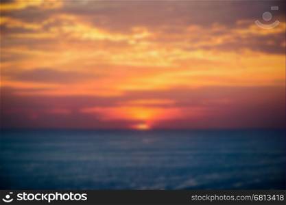 Blur background landscape of sunset over the Andaman sea from Laem Phromthep Cape scenic point is a famous attractions of Phuket Province in Thailand