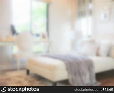 Blur bedroom with modern bedroom interior with working table