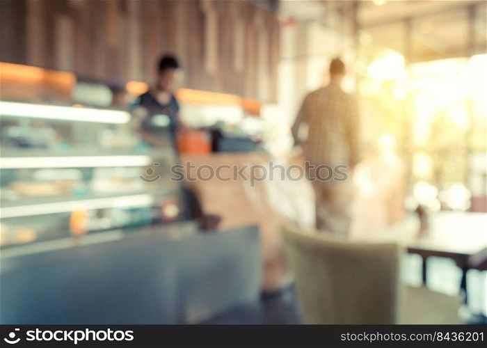 Blur coffee shop or cafe restaurant with abstract bokeh light.