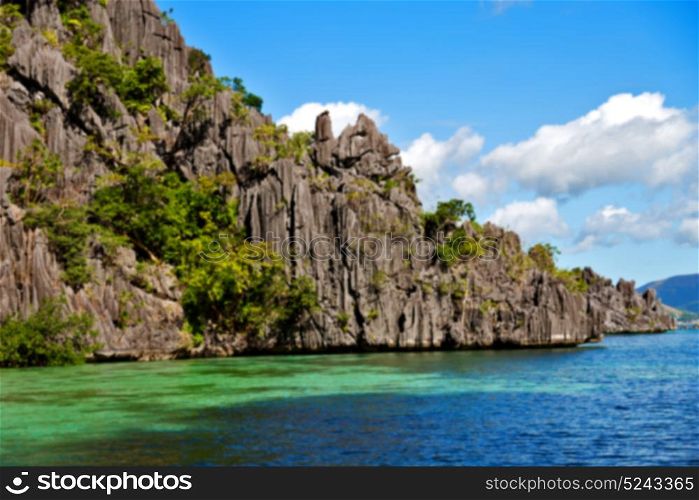 blur from a boat in philippines snake island near el nido palawan beautiful panorama coastline sea and rock