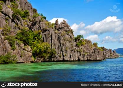 blur from a boat in philippines snake island near el nido palawan beautiful panorama coastline sea and rock