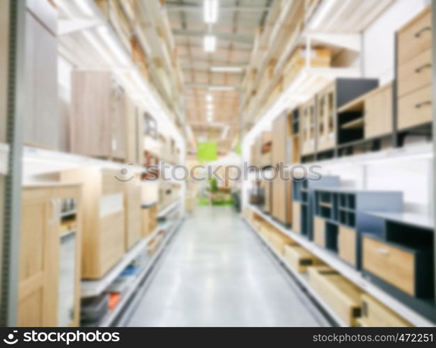 Blur furniture store interior for background. blurry industrial furniture merchandise inventory and wood material.