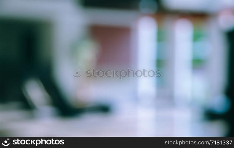 Blur image background of cozy living room with window light