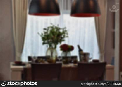 blur image of modern classic dining set in luxury dining room
