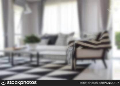 blur image of modern living room interior with black and white colors