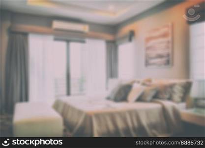 Blur image of modern luxury bedroom interior