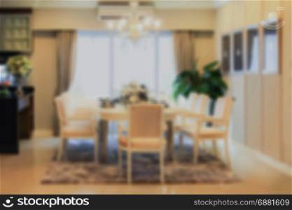 blur image of modern luxury dining room interior.