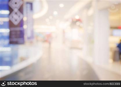 blur image of people shopping in department store with bokeh background.
