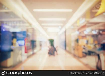 blur image of people shopping in department store with bokeh background.