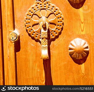 blur in iran antique door entrance and decorative handle for background