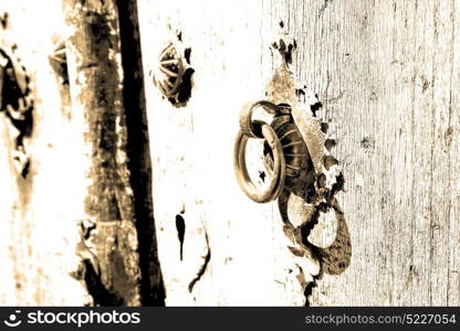 blur in iran antique door entrance and decorative handle for background