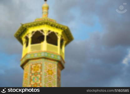 blur in iran islamic mausoleum old architecture mosque minaret near the sky