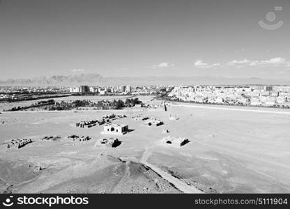 blur in iran near yazd the antique zoroastrian temple abandonated house and contruction