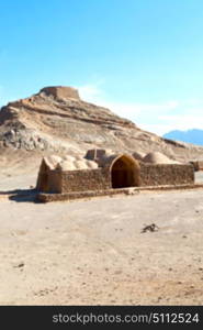 blur in iran near yazd the antique zoroastrian temple abandonated house and contruction