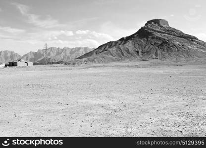 blur in iran near yazd the antique zoroastrian temple abandonated house and contruction