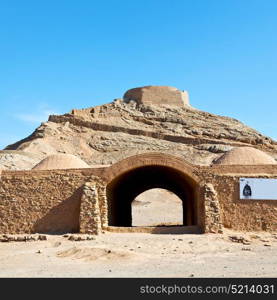 blur in iran near yazd the antique zoroastrian temple abandonated house and contruction