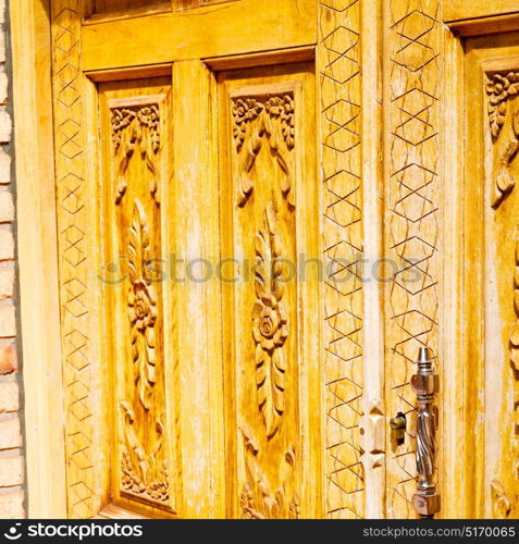 blur in iran old door near the mosque and antique construction