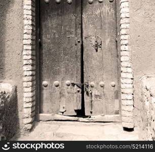 blur in iran old door near the mosque and antique construction