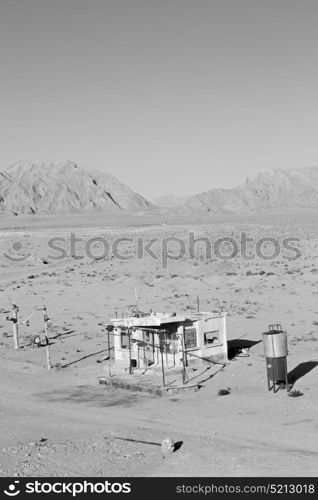 blur in iran old gas station the desert mountain background and nobody